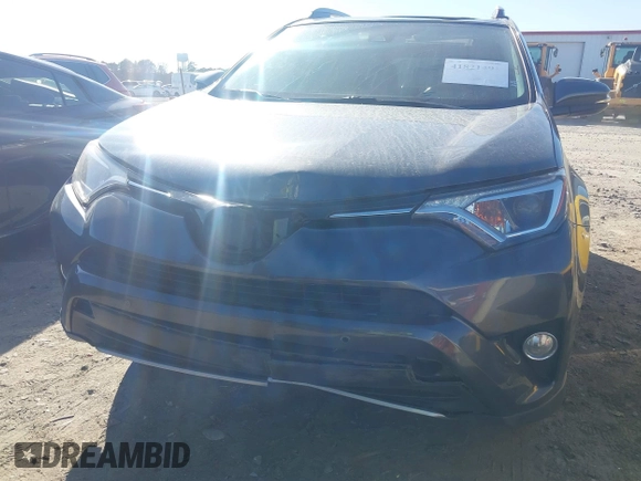2018 Toyota RAV4 XLE with VIN JTMWFREV9JJ200629, listed as a IAAI auction lot 41821491 with 184,706 mi miles. Bid and sale history available at carsss.com. Image 6.