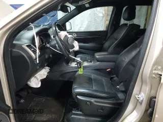 2015 Jeep Grand Cherokee Summit z VIN 1C4RJFJG1FC628532, wystawiony jako Copart lot #52546755 z przebiegiem 107 700 mil mil oraz Szkoda całkowita • Salvage title. Historia ofert i sprzedaży dostępna na DreamBid. Obrazek 7.