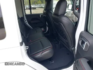 2021 Jeep Wrangler Unlimited Rubicon z VIN 1C4HJXFG1MW577829, wystawiony jako IAAI lot #41997002 z przebiegiem 26 443 mil mil oraz . Historia ofert i sprzedaży dostępna na DreamBid. Obrazek 8.
