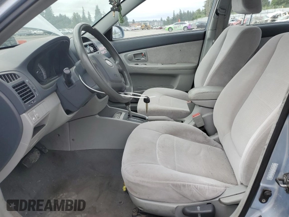 2007 Kia Spectra EX with VIN KNAFE121875438749, listed as a Copart auction lot 60255525 with 171,182 mi miles and Salvage title. Bid and sale history available at DreamBid. Image 7.
