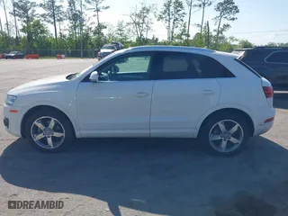 2015 Audi Q3 2.0T Premium Plus with VIN WA1EFCFS7FR010697, listed as a IAAI auction lot 41948566 with 167,001 mi miles. Bid and sale history available at carsss.com. Image 13.