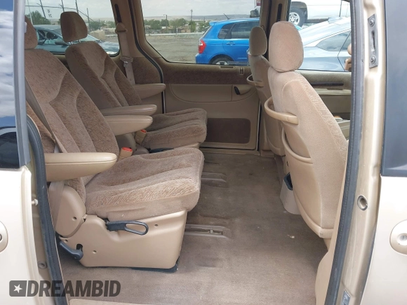1999 Chrysler Town & Country LXi with VIN 1C4GP54L0XB512495, listed as a IAAI auction lot 39677461 with 284,495 mi miles. Bid and sale history available at carsss.com. Image 8.