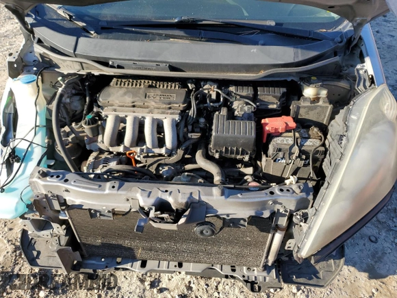 2009 Honda Fit with VIN JHMGE88219S050197, listed as a Copart auction lot 45876345 with 208,046 mi miles and Salvage Title. Bid and sale history available at DreamBid. Image 11.