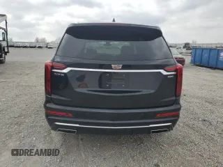 2020 Cadillac XT6 FWD Premium Luxury with VIN 1GYKPCRS2LZ138174, listed as a Copart auction lot 52495655 with 30,822 mi miles and Salvage Title. Bid and sale history available at carsss.com. Image 6.