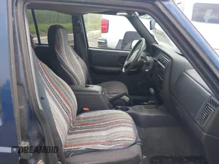 2000 Jeep Cherokee Classic with VIN 1J4FF58S1YL122706, listed as a IAAI auction lot 42560421 with 157,478 mi miles and . Bid and sale history available at DreamBid. Image 5.