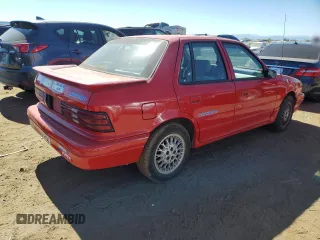 1993 Plymouth Sundance z VIN 1P3XP6833PN674720, wystawiony jako Copart lot #73213074 z przebiegiem 128 073 mil mil oraz Tytuł czysty. Historia ofert i sprzedaży dostępna na DreamBid. Obrazek 3.