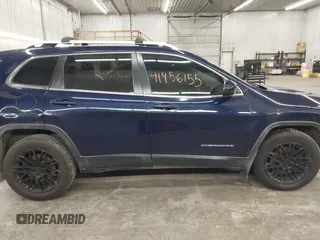 2014 Jeep Cherokee Latitude with VIN 1C4PJMCS9EW190255, listed as a IAAI auction lot 41956155 with 220,265 mi miles. Bid and sale history available at carsss.com. Image 13.