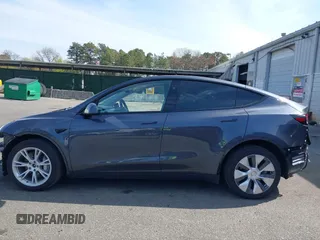 2023 Tesla Model Y Long Range with VIN 7SAYGDEE7PF856985, listed as a IAAI auction lot 42097675 with 13,112 mi miles and . Bid and sale history available at DreamBid. Image 15.