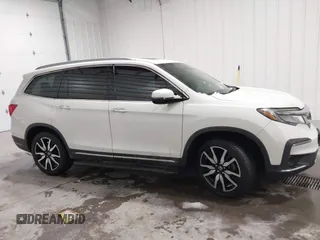 2019 Honda Pilot Touring 7-Passenger with VIN 5FNYF6H64KB005798, listed as a IAAI auction lot 41551933 with 103,151 mi miles. Bid and sale history available at carsss.com. Image 13.