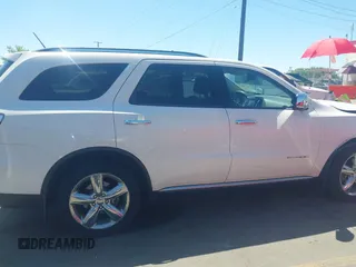 2012 Dodge Durango Citadel with VIN 1C4SDJET0CC100625, listed as a IAAI auction lot 42170821 with 130,866 mi miles and . Bid and sale history available at DreamBid. Image 13.