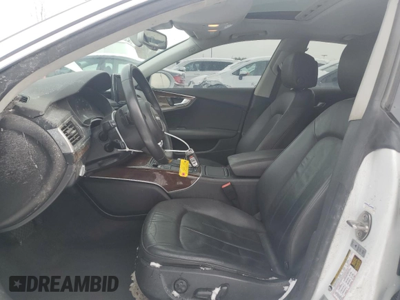 2014 Audi A7 Premium Plus z VIN WAUWGAFC3EN126101, wystawiony jako Copart lot #41959495 z przebiegiem 144 594 mil mil oraz Tytuł czysty. Historia ofert i sprzedaży dostępna na DreamBid. Obrazek 7.