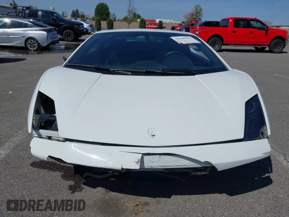 2009 Lamborghini Gallardo z VIN ZHWGU54T59LA07777, wystawiony jako IAAI lot #39749159 z przebiegiem 8730 mil mil oraz . Historia ofert i sprzedaży dostępna na DreamBid. Obrazek 13.