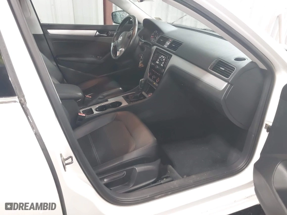 2013 Volkswagen Passat SE w/Sunroof with VIN 1VWBH7A35DC111003, listed as a IAAI auction lot 41991990 with 142,103 mi miles. Bid and sale history available at carsss.com. Image 5.
