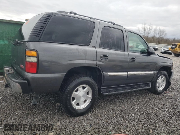 2005 GMC Yukon SLT z VIN 1GKEC13T35J119126, wystawiony jako Copart lot #47849455 z przebiegiem 301 785 mil mil oraz Szkoda całkowita • Salvage title. Historia ofert i sprzedaży dostępna na DreamBid. Obrazek 3.