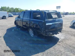 2021 Ford Expedition XLT with VIN 1FMJU1HT1MEA60855, listed as a IAAI auction lot 41962157 with 100,178 mi miles and . Bid and sale history available at DreamBid. Image 3.