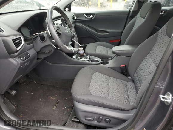 2018 Hyundai Ioniq SEL z VIN KMHC75LCXJU098262, wystawiony jako Copart lot #58021315 z przebiegiem 56 396 mil mil oraz Szkoda całkowita • Salvage title. Historia ofert i sprzedaży dostępna na DreamBid. Obrazek 7.