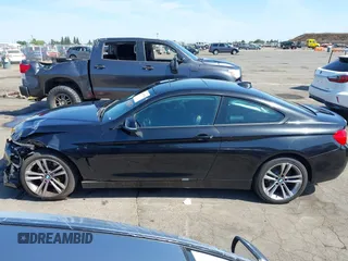 2014 BMW 4 Series 428i xDrive with VIN WBA3N9C53EK244907, listed as a IAAI auction lot 42380025 with 71,431 mi miles and . Bid and sale history available at DreamBid. Image 14.