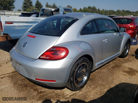 2012 Volkswagen Beetle 2.5L w/Sun PZEV with VIN 3VWJP7AT6CM601557, listed as a Copart auction lot 68744194 with 71,713 mi miles and Salvage Title. Bid and sale history available at carsss.com. Image 3.