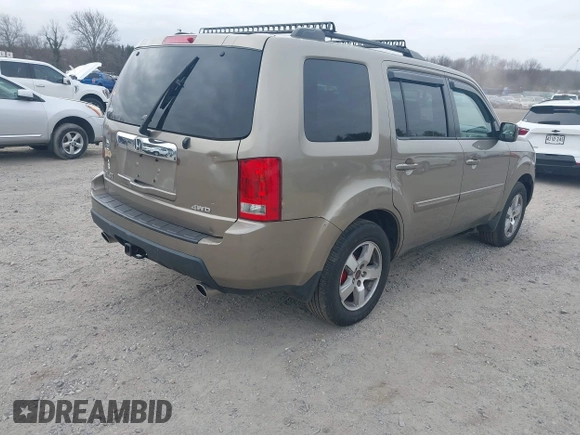 2011 Honda Pilot EX-L with VIN 5FNYF4H68BB038615, listed as a IAAI auction lot 41785830 with 164,324 mi miles and . Bid and sale history available at carsss.com. Image 4.