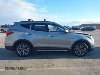 2018 Hyundai Santa Fe Ultimate z VIN 5XYZW4LA1JG515019, wystawiony jako IAAI lot #42248389 z przebiegiem 60 222 mil mil oraz . Historia ofert i sprzedaży dostępna na DreamBid. Obrazek 13.