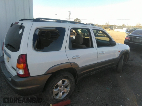 2003 Mazda Tribute LX with VIN 4F2YZ04153KM18168, listed as a IAAI auction lot 39240269 with 225,859 mi miles and . Bid and sale history available at DreamBid. Image 4.
