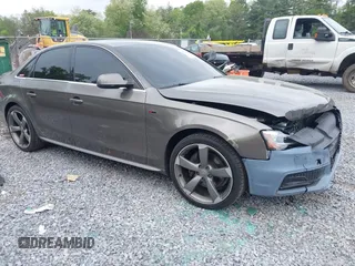 2014 Audi A4 Premium Plus z VIN WAUFFAFL7EN006692, wystawiony jako IAAI lot #42354027 z przebiegiem 99 560 mil mil oraz . Historia ofert i sprzedaży dostępna na DreamBid. Obrazek 1.