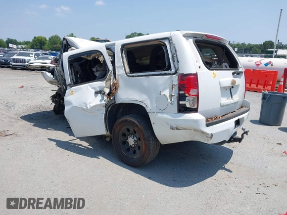 2013 Chevrolet Tahoe Commercial with VIN 1GNLC2E08DR216213, listed as a IAAI auction lot 37406061 with Not provided miles and . Bid and sale history available at DreamBid. Image 3.