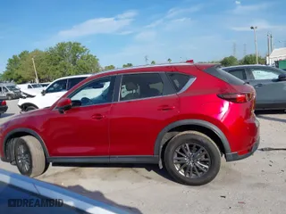 2020 Mazda CX-5 Touring with VIN JM3KFACMXL1819518, listed as a IAAI auction lot 41911679 with 50,357 mi miles. Bid and sale history available at carsss.com. Image 15.