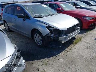2016 Subaru Impreza 2.0i z VIN JF1GPAA64G8249776, wystawiony jako IAAI lot #42019229 z przebiegiem 95 959 mil mil oraz . Historia ofert i sprzedaży dostępna na DreamBid. Obrazek 1.