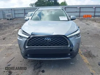 2023 Toyota Corolla Cross XLE with VIN 7MUDAAAG0PV057750, listed as a IAAI auction lot 42302284 with 31,404 mi miles and . Bid and sale history available at DreamBid. Image 6.