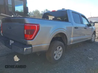 2023 Ford F-150 XL with VIN 1FTEW1C80PKE77571, listed as a IAAI auction lot 41648122 with 49,196 mi miles and . Bid and sale history available at DreamBid. Image 4.