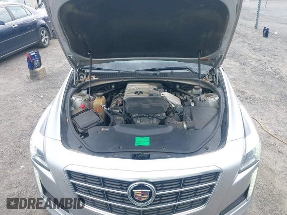 2014 Cadillac CTS Luxury AWD z VIN 1G6AX5SX2E0196881, wystawiony jako IAAI lot #41707633 z przebiegiem 169 168 mil mil oraz . Historia ofert i sprzedaży dostępna na DreamBid. Obrazek 10.