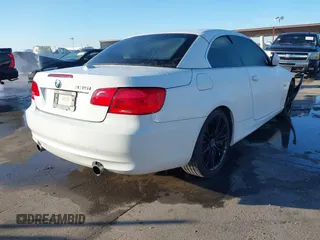 2011 BMW 3 Series 335i with VIN WBADX7C56BE743018, listed as a IAAI auction lot 41643116 with Not Provided miles and . Bid and sale history available at DreamBid. Image 4.