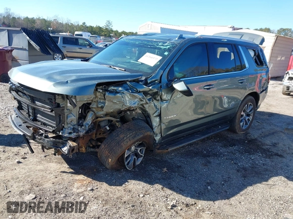 2023 Chevrolet Tahoe LS with VIN 1GNSCMKD5PR444303, listed as a IAAI auction lot 41260372 with 13,180 mi miles and . Bid and sale history available at DreamBid. Image 2.