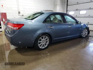 2011 Lincoln MKZ Hybrid z VIN 3LNDL2L33BR755653, wystawiony jako Copart lot #57050605 z przebiegiem 62 424 mil mil oraz Szkoda całkowita • Salvage title. Historia ofert i sprzedaży dostępna na DreamBid. Obrazek 3.
