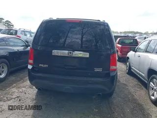 2012 Honda Pilot Touring with VIN 5FNYF4H92CB051260, listed as a IAAI auction lot 41906802 with 256,691 mi miles. Bid and sale history available at carsss.com. Image 16.