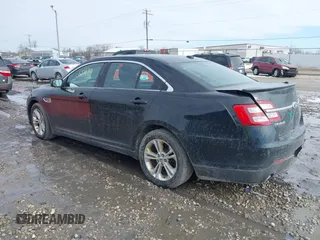 2013 Ford Taurus SEL with VIN 1FAHP2E86DG135835, listed as a IAAI auction lot 41665430 with 130,816 mi miles. Bid and sale history available at carsss.com. Image 3.
