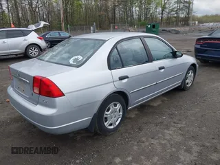 2001 Honda Civic LX with VIN 1HGES16581L043706, listed as a IAAI auction lot 42045657 with 149,285 mi miles. Bid and sale history available at carsss.com. Image 4.