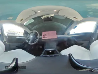 2023 Tesla Model 3 z VIN 5YJ3E1EAXPF422956, wystawiony jako Copart lot #52500285 z przebiegiem 24 082 mil mil oraz Nie do naprawy • Non repairable. Historia ofert i sprzedaży dostępna na DreamBid. Obrazek 14.