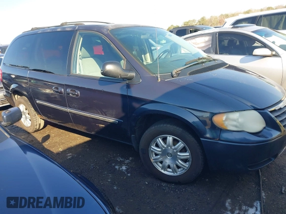 2007 Chrysler Town & Country LWB Touring with VIN 2A4GP54L97R310749, listed as a IAAI auction lot 41709804 with 1 mi miles. Bid and sale history available at carsss.com. Image 1.