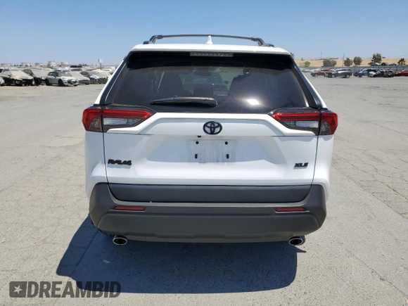 2022 Toyota RAV4 XLE with VIN 2T3W1RFV8NW233397, listed as a Copart auction lot 65276715 with 20,956 mi miles and Salvage title. Bid and sale history available at DreamBid. Image 6.