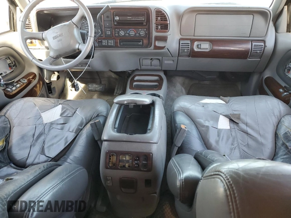 2000 GMC Denali z VIN 1GKEK13R8YR109690, wystawiony jako Copart lot #76165584 z przebiegiem 153 366 mil mil oraz Szkoda całkowita • Salvage title. Historia ofert i sprzedaży dostępna na DreamBid. Obrazek 8.