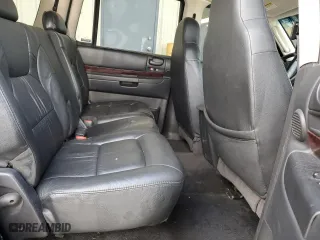 2001 Dodge Durango with VIN 1B4HS28Z71F592326, listed as a Copart auction lot 65591464 with 125,080 mi miles and Salvage Title. Bid and sale history available at carsss.com. Image 11.