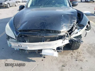 2013 Infiniti M with VIN JN1BY1AR3DM600436, listed as a IAAI auction lot 42031696 with 114,637 mi miles and . Bid and sale history available at DreamBid. Image 6.