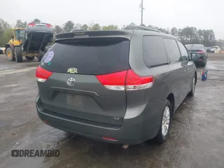 2013 Toyota Sienna XLE AAS with VIN 5TDYK3DC8DS401561, listed as a IAAI auction lot 41990044 with 214,111 mi miles and . Bid and sale history available at DreamBid. Image 4.