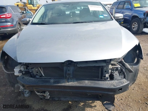 2014 Volkswagen Passat Wolfsburg Ed with VIN 1VWAT7A38EC089882, listed as a IAAI auction lot 41945624 with 130,162 mi miles. Bid and sale history available at carsss.com. Image 6.
