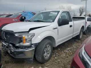 2019 Ford F-150 XL with VIN 1FTMF1C50KKC79325, listed as a Copart auction lot 84731164 with 100,643 mi miles and Salvage Title. Bid and sale history available at carsss.com. Image 1.