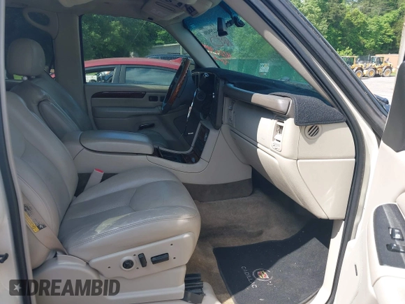 2003 Cadillac Escalade z VIN 1GYEK63N23R120693, wystawiony jako IAAI lot #42259496 z przebiegiem 234 263 mil mil oraz . Historia ofert i sprzedaży dostępna na DreamBid. Obrazek 5.