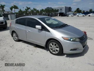 2010 Honda Insight EX with VIN JHMZE2H74AS032878, listed as a Copart auction lot 56230795 with 125,838 mi miles and Clean title. Bid and sale history available at DreamBid. Image 4.