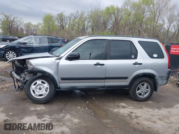 2002 Honda CR-V LX z VIN JHLRD78402C077631, wystawiony jako IAAI lot #41918750 z przebiegiem 186 827 mil mil oraz . Historia ofert i sprzedaży dostępna na DreamBid. Obrazek 14.